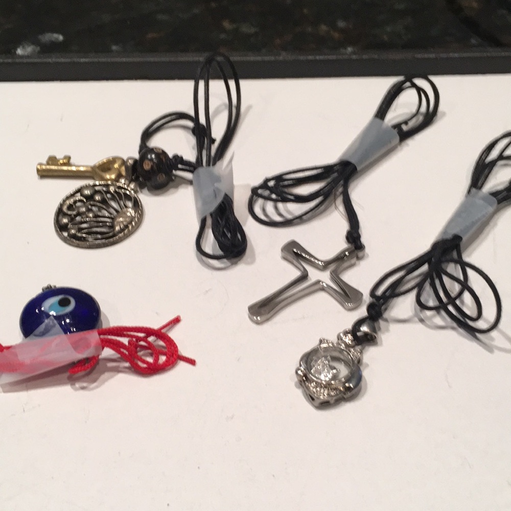 NWOT Set of Four Amulets